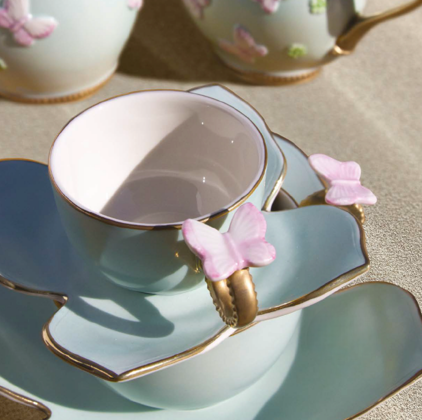 BUTTERFLY TEA CUP & SAUCER